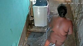 hidden cam catches busty stepmom bathing and flashing huge tits outside