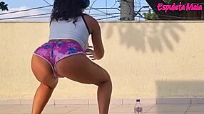 curvy brunette hikes shorts deep into ass crack outdoors