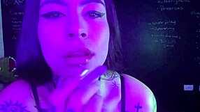 Tattooed babe moans solo with vibrator on natural tits