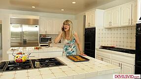 yo, that blonde granny's taking big black cock deep in every hole