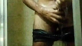 skinny brazilian strokes huge cock in shower till explosive cumshot?