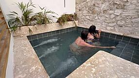 imagine two horny latina lesbians fingering wet pussies in public pool scared of getting caught