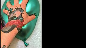 Tattooed Girl's Bath Balloon Tease Ignites Desire