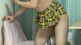 look at those natural tits bursting from her short uniform under desk!!