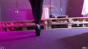 sexy bare soles tease rubbing cream close up on toes