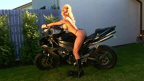 man, Caylan Curtis' solo masturbation with those big blonde milf tits in fishnets is unreal!