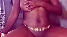 Sweet ebony teases pussy with dildo till she cums hard