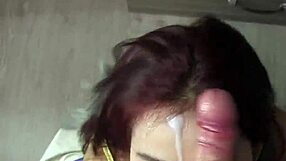 cum-covered cutie smears it thick across her smiling face