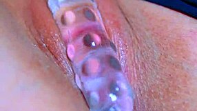18yo brunette teen's puffy shaved pussy grips glass dildo in wet orgasmic homemade play