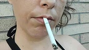 Kelly Kendricks Bares Massive Cleavage Smoking in Bright Sunlight