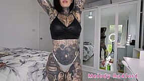 black red pink micro bikini clings to melody radford's huge tits in sexy gym try on!!