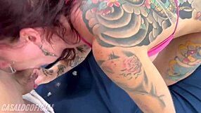 wow check out this tattooed hottie flashing her huge tits and pierced nipples in homemade swingers fun!