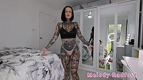 black red pink micro bikini clings to melody radford's huge tits in sexy gym try on!!