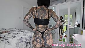 black red pink micro bikini clings to melody radford's huge tits in sexy gym try on!!