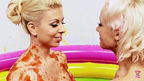 Amazing Bitch Lou Lou Wrestles Lesbian Friend In Jelly