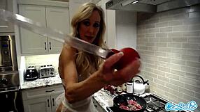Brandi Love Cooks in Lingerie Showing Big Tits and Trimmed Pussy