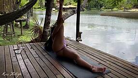 Married slut crams swimsuit into cameltoe pussy during lakeside yoga tease