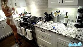 Brandi Love Cooks in Lingerie Showing Big Tits and Trimmed Pussy