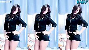 Who's this cute Korean babe dancing sexy just for you?