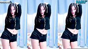 Who's this cute Korean babe dancing sexy just for you?