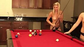 cute lesbian babe flashes natural tits during billiard play