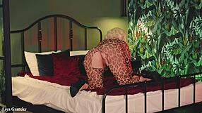 ripped catsuit exposes mature blonde's pierced pussy fuck