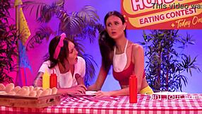 Dkye wets her strapon fingering petite latina in hotdog lesbian contest 😈👅