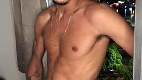 Naughty boy jerks off huge load at building window with handjob tease.