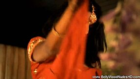Bollywood babe sensually dances stripping clothes teasing viewers