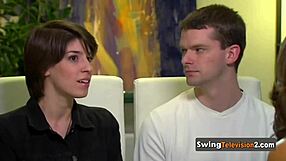 In the swinger gathering, the eager couple caresses and savors every inch of each other's naked bodies intimately