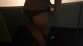 mature fit mistress teases with slow striptease ripping clothes off her tall petite frame