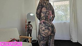 curvy model shows off sheer micro bikini in bedroom try-on