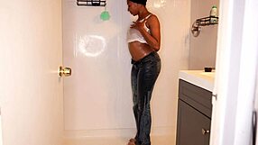 Ebony Model Pees Messy Pants Wet in Shower