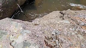 they sneak backshots by the river in a steamy outdoor quickie flashing curvy asses