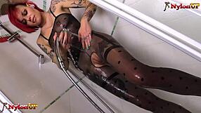 Tattooed Onix Babe Dildo Fucks Pantyhose Clad Body in Shower