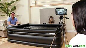 naughty big tit brunette masseuse gal ritchie films wet nuru massage on seth gamble