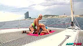 I've spotted two european girls kissing and licking outdoors on a boat off barcelona's high seas