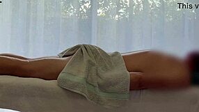 Asian babe oils caucasian cock for massive handjob cum explosion