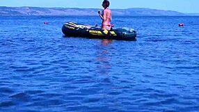 Mature babe poses in bikini on Volga River boat ride