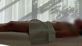 Asian babe oils caucasian cock for massive handjob cum explosion