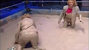 WWF Ivory slams Miss Kitty in epic mud wrestling match