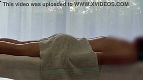 Asian babe oils caucasian cock for massive handjob cum explosion