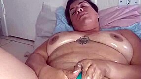 She grabs huge dildo fucks wet pussy till squirting orgasm