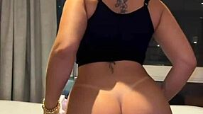 Tanned Brazilian hottie shakes ass tub tease bed cum call