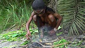 african native beauty cooks fresh meal deep in jungle kitchen