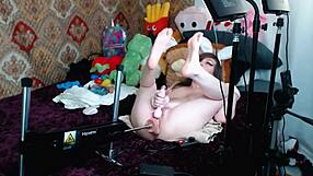 Gamergirl Roxy in bunny ears rides fuckmachine to orgasm on bed