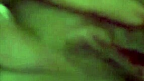 Latina masturbates with dildo closeup in bedroom.