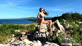 Watch this perfect model masturbate her shaved pussy with a toy on a public mountain - not scared of getting caught!