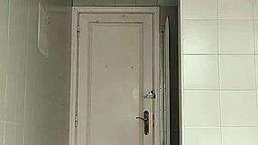 a sexy guy slips into the bathroom at the beach pulls down his black shorts and carefully shaves his smooth body