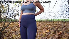 damn that milf in tight yoga leggings teases her fat cameltoe pussy outside